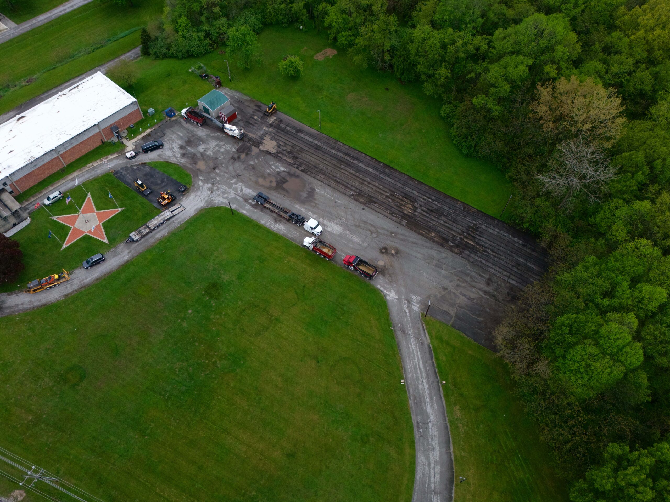 Worn construction-phase asphalt before paving