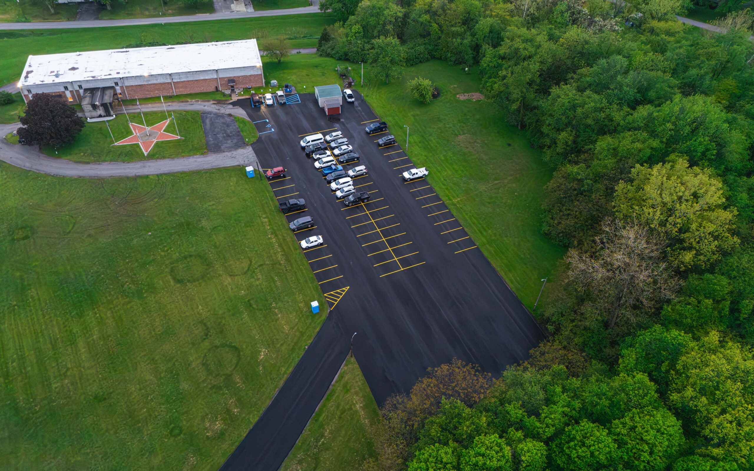 Finished asphalt paving with fresh striping